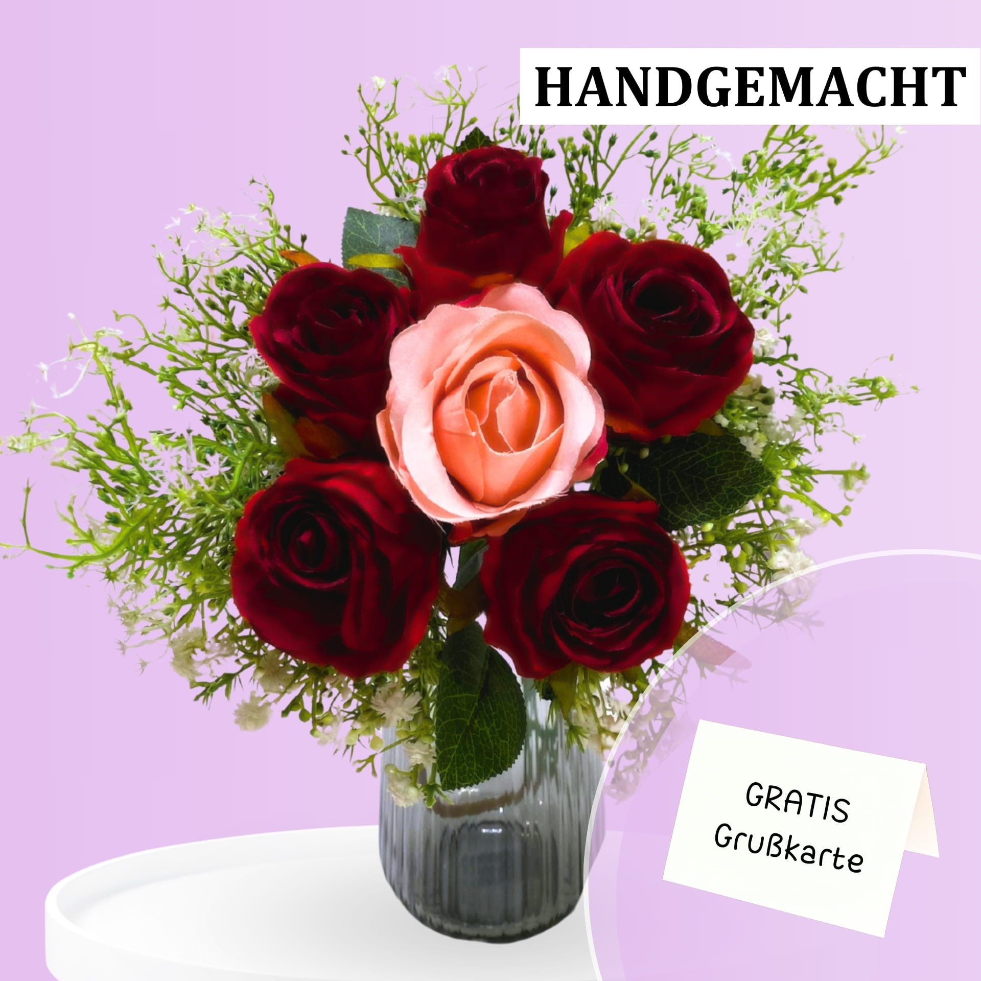 Romantischer Strauß mit Rosen hier versenden Ein Strauß mit 5 roten Rosen & einer pinken Rose in der Mitte.